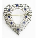 CHILD & CHILD. A BLUE PASTE AND SILVER OPENWORK HEART SHAPED BROOCH, 41MM H, MAKER'S MARK ONLY,