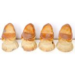 A SET OF FOUR DERBYSHIRE SALTGLAZED BROWN STONEWARE 'TURKS HEAD' WINDOW WEDGES, 13CM H, C1830++Two