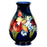 A MOORCROFT ORCHID VASE DESIGNED BY WALTER MOORCROFT, C1960-80, 21CM H, IMPRESSED MARKS, PAINTED