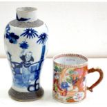 A CHINESE EXPORT PORCELAIN CYLINDRICAL MUG, ENAMELLED IN A VIBRANT PALETTE WITH A 'MANDARIN'