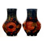 A PAIR OF MOORCROFT POMEGRANATE VASES DESIGNED BY WILLIAM MOORCROFT, C1920, 17CM H, IMPRESSED MARKS,