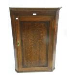 A VICTORIAN OAK CORNER CUPBOARD WITH PANELLED DOOR, 170CM H X 70CM