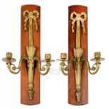 A PAIR OF LOUIS XVI STYLE ORMOLU TWIN BRANCH WALL LIGHTS DESIGNED AS A QUIVER OF ARROWS HANGING FROM