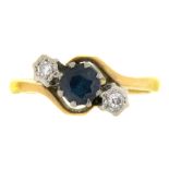 A SAPPHIRE AND DIAMOND RING IN 18CT GOLD, BIRMINGHAM 1994, 3.45G, SIZE N++BUILD UP OF DIRT AND