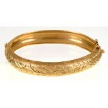 A GOLD BANGLE, MARKED 14K, 62 MM D, 24.8G++GOOD CONDITION