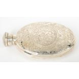 A VICTORIAN OVAL SILVER HIP FLASK, ENGRAVED WITH PANELS OF FLOWERS AND STRAPWORK, MILLED SCREW