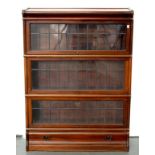 A MAHOGANY SECTIONAL THREE TIER BOOKCASE, 117CM H; 86 X 25CM