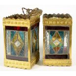 TWO SIMILAR SQUARE EMBOSSED BRASS HALL LANTERNS WITH LEADED GLASS SIDES, 27 AND 28CM H, EARLY 20TH