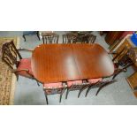 A SET OF EIGHT CARVED MAHOGANY DINING CHAIRS, INCLUDING TWO ELBOW CHAIRS AND A MAHOGANY EXTENDING