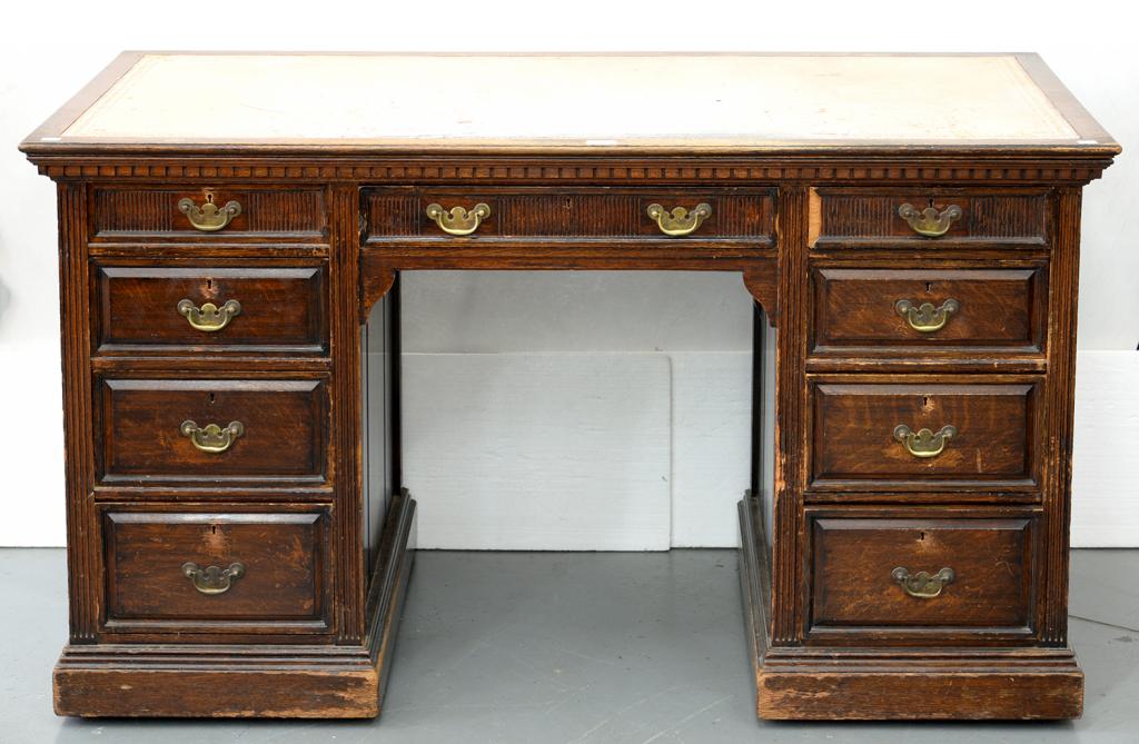 AN OAK PARTNERS DESK WITH LEATHER TOP, C1930'S, 77CM H; 137 X 70CM