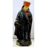 A CONTINENTAL GLAZED EARTHENWARE FIGURE OF A MONK, PROBABLY BELGIAN, 43CM H, LATE 19TH C