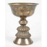 A TIBETAN SILVER COLOURED METAL CUP, 13.5CM H, 6OZS 10DWTS, LATE 19TH C