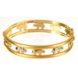 A CYPRIOT GOLD BANGLE, MARKED 585, DENTED, 58 MM D, 19.3G++GOOD CONDITION