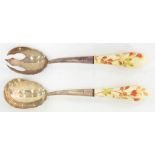 A PAIR OF VICTORIAN SILVER PORCELAIN HAFTED SALAD SERVERS, LONDON 1888