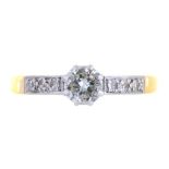 A DIAMOND SOLITAIRE RING WITH ROUND BRILLIANT CUT DIAMOND AND MILLEGRAIN SET DIAMOND SHOULDERS,