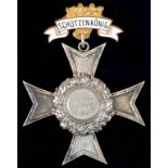 A CONTINENTAL SILVER SHOOTING PRIZE CROSS THE CENTRE ENGRAVED KONIG 1933, A GILTMETAL AND ENAMEL