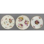 THREE DERBY PLATES, C1820 including an osier moulded example, all painted with flowers, the