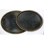 TWO VICTORIAN OVAL JAPANNED TRAYS, THE LARGER PAINTED WITH FOLIAGE, 76CM L