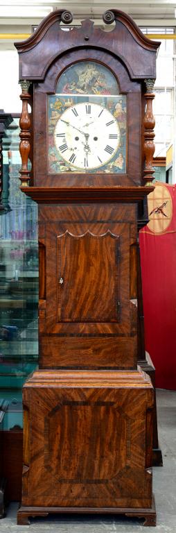 A VICTORIAN EIGHT DAY MAHOGANY AND CROSS BANDED LONGCASE CLOCK, THE BREAK ARCHED DIAL PAINTED WITH