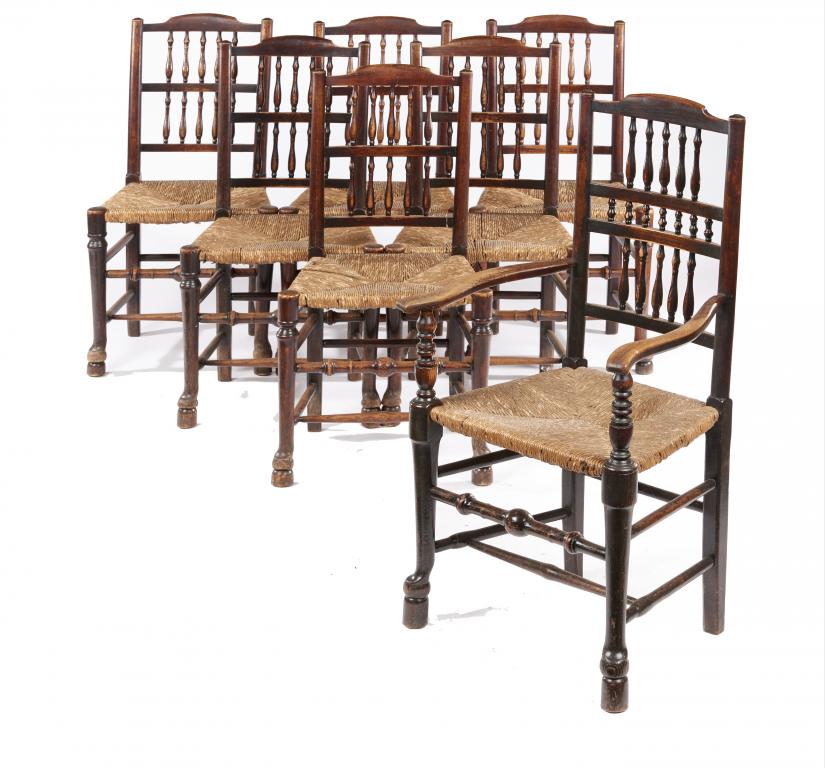 SEVEN ASH SPINDLE BACK CHAIRS, NORTH WEST REGION, EARLY 19TH C rush seated, elbow chair 113cm h++