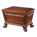 AN EARLY VICTORIAN MAHOGANY CELLARETTE, C1840 of sarcophagus shape with panelled sides, the lead