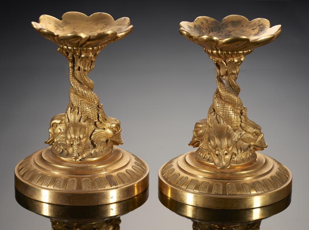 A PAIR OF FRENCH ORMOLU STANDS, 19TH C on finely chiselled dolphin support 12cm h++Good condition