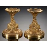 A PAIR OF FRENCH ORMOLU STANDS, 19TH C on finely chiselled dolphin support 12cm h++Good condition