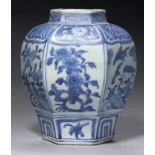 A CHINESE BLUE AND WHITE HEXAGONAL JAR, 17TH C painted with panels of birds and flowers beneath