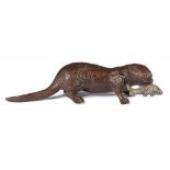 AN AUSTRIAN COLD PAINTED BRONZE MINIATURE SCULPTURE OF AN OTTER, 20TH C 16cm l++Paint worn,