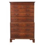 A GEORGE III OAK CHEST ON CHEST, LATE 18TH C with dentil cornice and fruitwood veneered frieze,