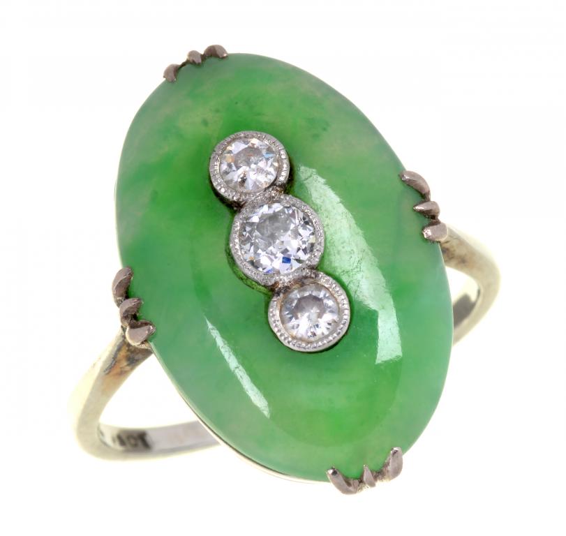 A JADEITE AND DIAMOND RING, C1940 white gold hoop marked PT 18 CT, 4.4g, size M½++Good condition