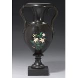 A VICTORIAN ASHFORD BLACK MARBLE VASE, C1870 of polished slate, inlaid in marble and malachite, 30cm