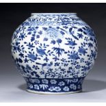 A CHINESE BLUE AND WHITE JAR, QING DYNASTY, 19TH C painted with birds and flowers in diaper and '