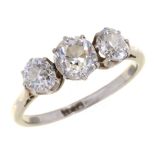 A DIAMOND THREE STONE RING with old cut diamonds, in platinum, marked PLAT, 3.3g, size L++Tiny