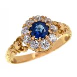 A SAPPHIRE AND DIAMOND CLUSTER RING, EARLY 20TH C in gold, 2.6g, size H++Good condition