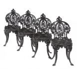 A SET OF FOUR CAST-IRON GARDEN CHAIRS, IN VICTORIAN STYLE with round seat, 83cm h, black