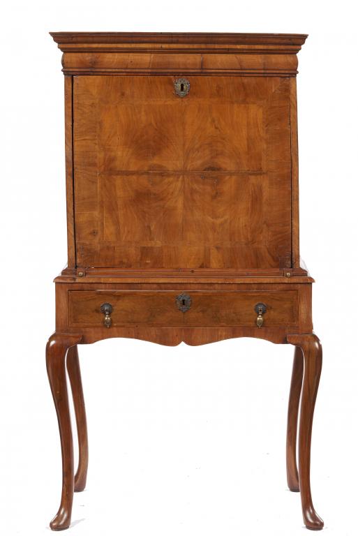 A WILLIAM III WALNUT AND FEATHERBANDED SCRIPTOR, C1690 on later stand with a drawer with stepped