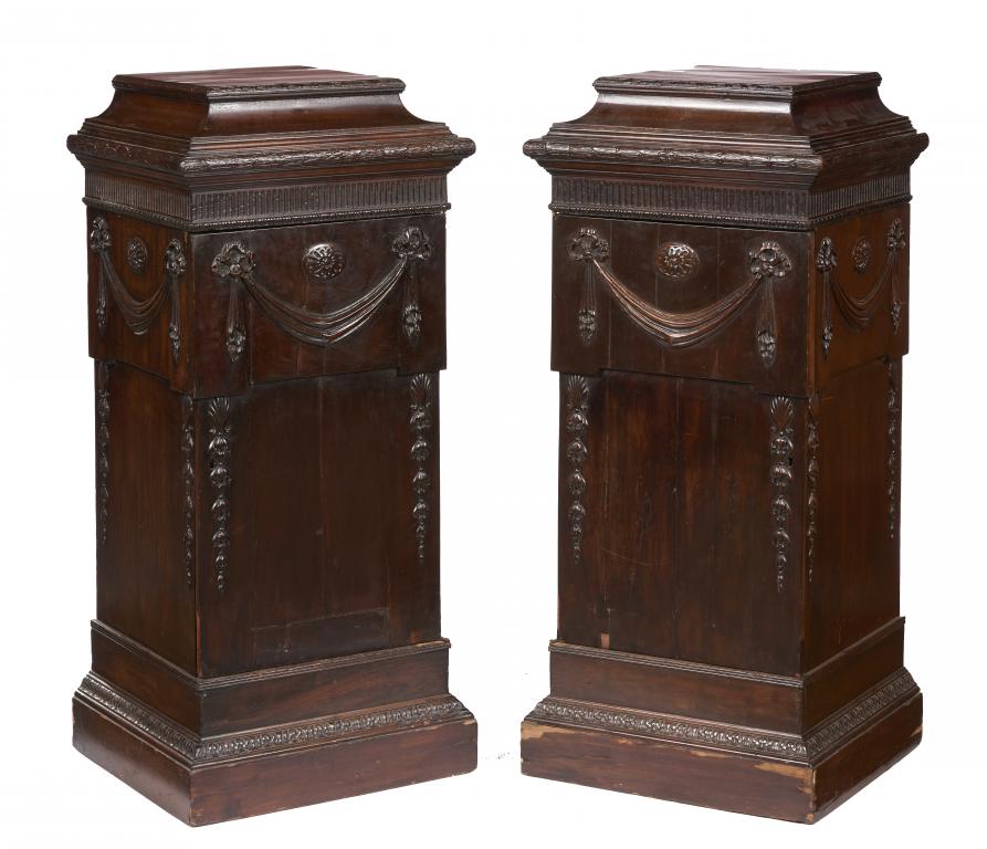 A PAIR OF VICTORIAN NEO CLASSICAL STYLE MAHOGANY DINING ROOM PEDESTALS, 19TH C with husk carved