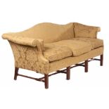 A MAHOGANY SOFA IN GEORGE III STYLE, 20TH C on moulded square legs with chamfered stretchers, 80cm