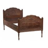 A LOUIS XVI PROVINCIAL CARVED OAK BED, C1780 the head, footboard and rails decorated with neo