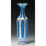 AN OVERLAY GLASS VASE, FRENCH OR BOHEMIAN, C1860 in blue glass overlaid in white and gilt with