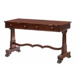 A VICTORIAN ROSEWOOD WRITING TABLE the rectangular top fitted with two drawers, on trestles with