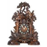 A BLACK FOREST CARVED WOOD CUCKOO CLOCK, LATE 19TH C with Gordian Hettich Sohn gong striking fusee