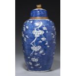 AN ORMOLU MOUNTED CHINESE BLUE AND WHITE PRUNUS JAR AND COVER, THE PORCELAIN 19TH C adapted as a