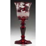 A BOHEMIAN RUBY GLASS GOBLET, C1860 the bell bowl wheel engraved with a continuous forest