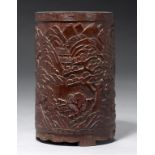 A CHINESE BAMBOO BRUSH POT carved with a continuous river scene, trees and mountains, 17cm h++Some