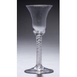 AN ENGLISH WINE GLASS, C1770 the bell bowl on double series opaque twist stem, conical foot, 17.