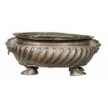 A DUTCH BRASS REPOUSSÉ WINE CISTERN, 18TH C of lobed oval shape with lion mask handles and paw feet,