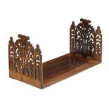 A VICTORIAN ROSEWOOD BOOK SLIDE with gothic fretwork ends, 40cm l unextended++Good condition, the