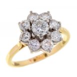 A DIAMOND CLUSTER RING of nine round brilliant cut diamonds, gold hoop, 4.6g, size O++Good